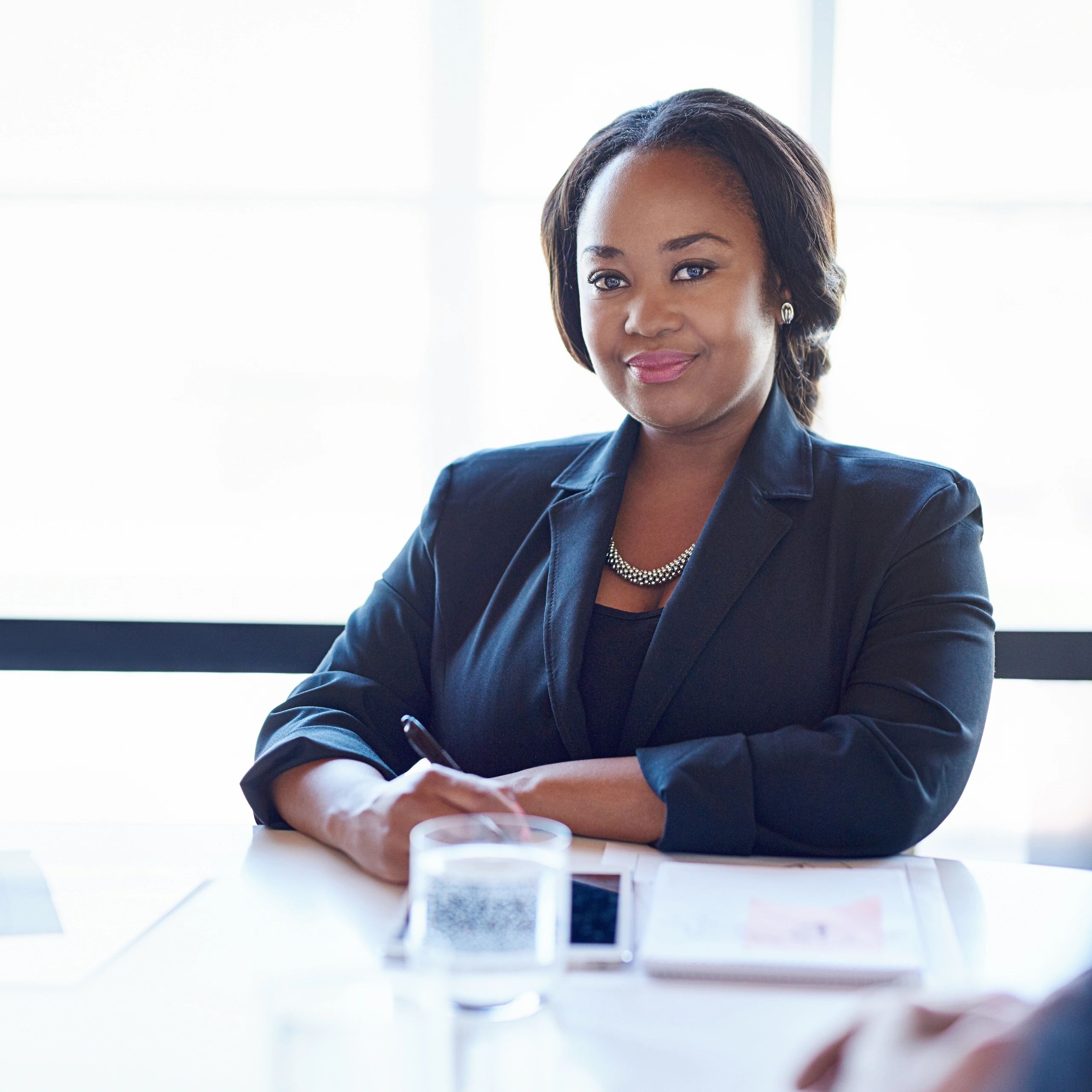 Black-and-white portrait of a female healthcare executive